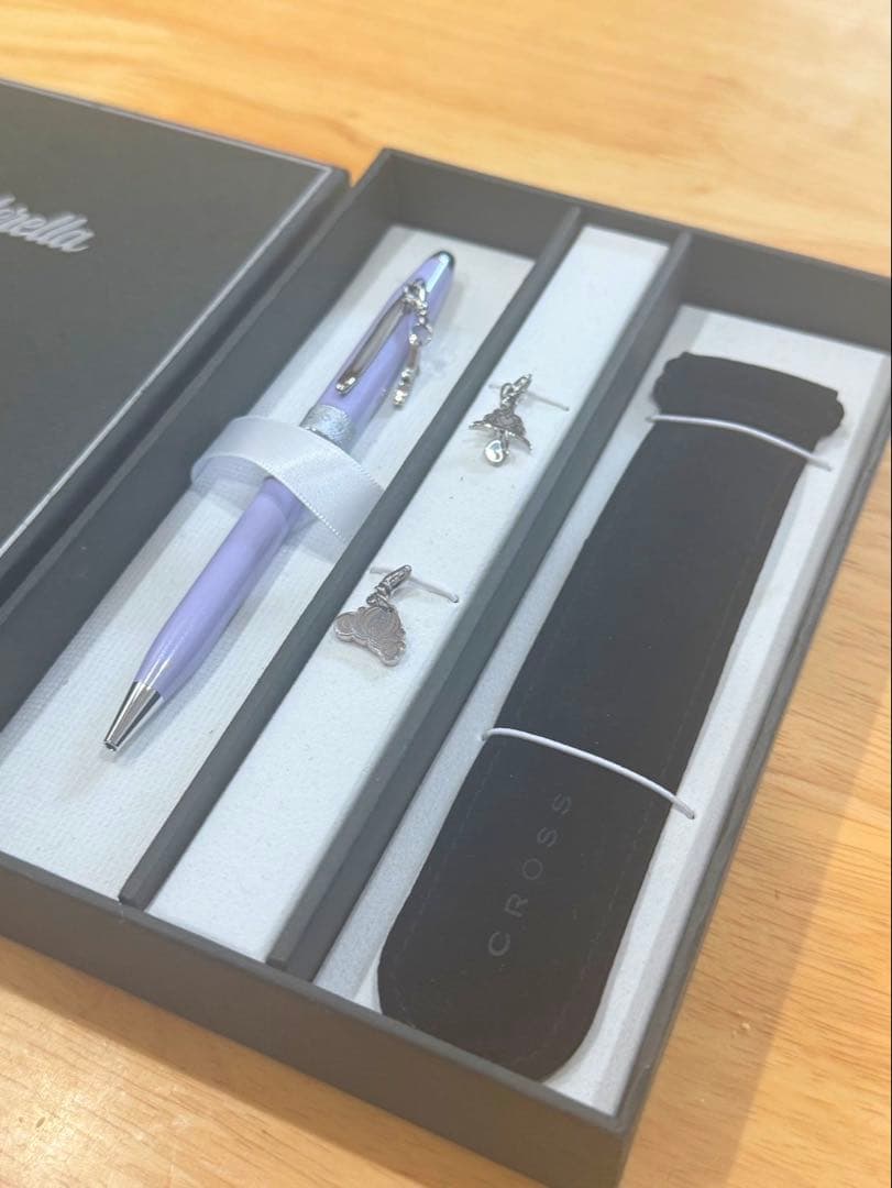 Cinderella Cross ballpoint pen in black with silver accents wrapped in protective pouch