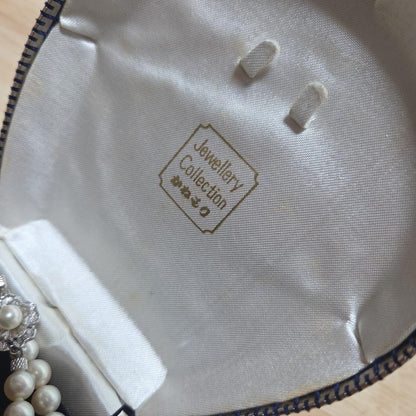 Elegant Akoya pearl necklace with white round pearls arranged in a single strand