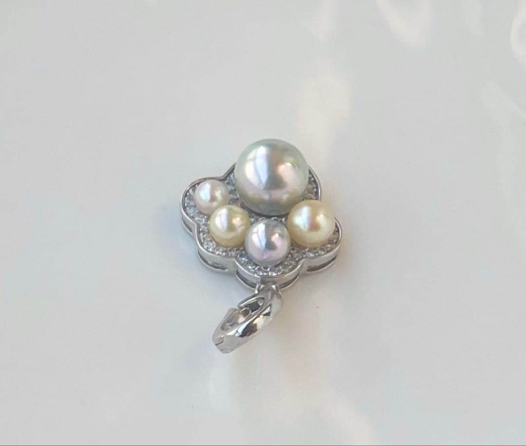 Akoya pearl multi-color pendant with blue pearl center and openable heart-shaped paw print bail on S925 silver