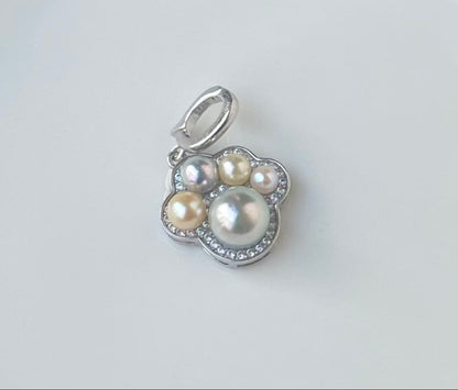Akoya pearl multi-color pendant with blue pearl center and openable heart-shaped paw print bail on S925 silver