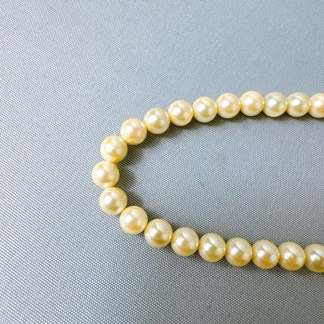 Honpa Akoya pearl necklace with 7mm round pearls and silver clasp, approximately 46cm long