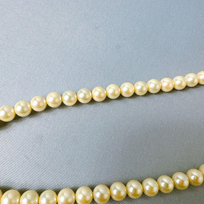 Honpa Akoya pearl necklace with 7mm round pearls and silver clasp, approximately 46cm long