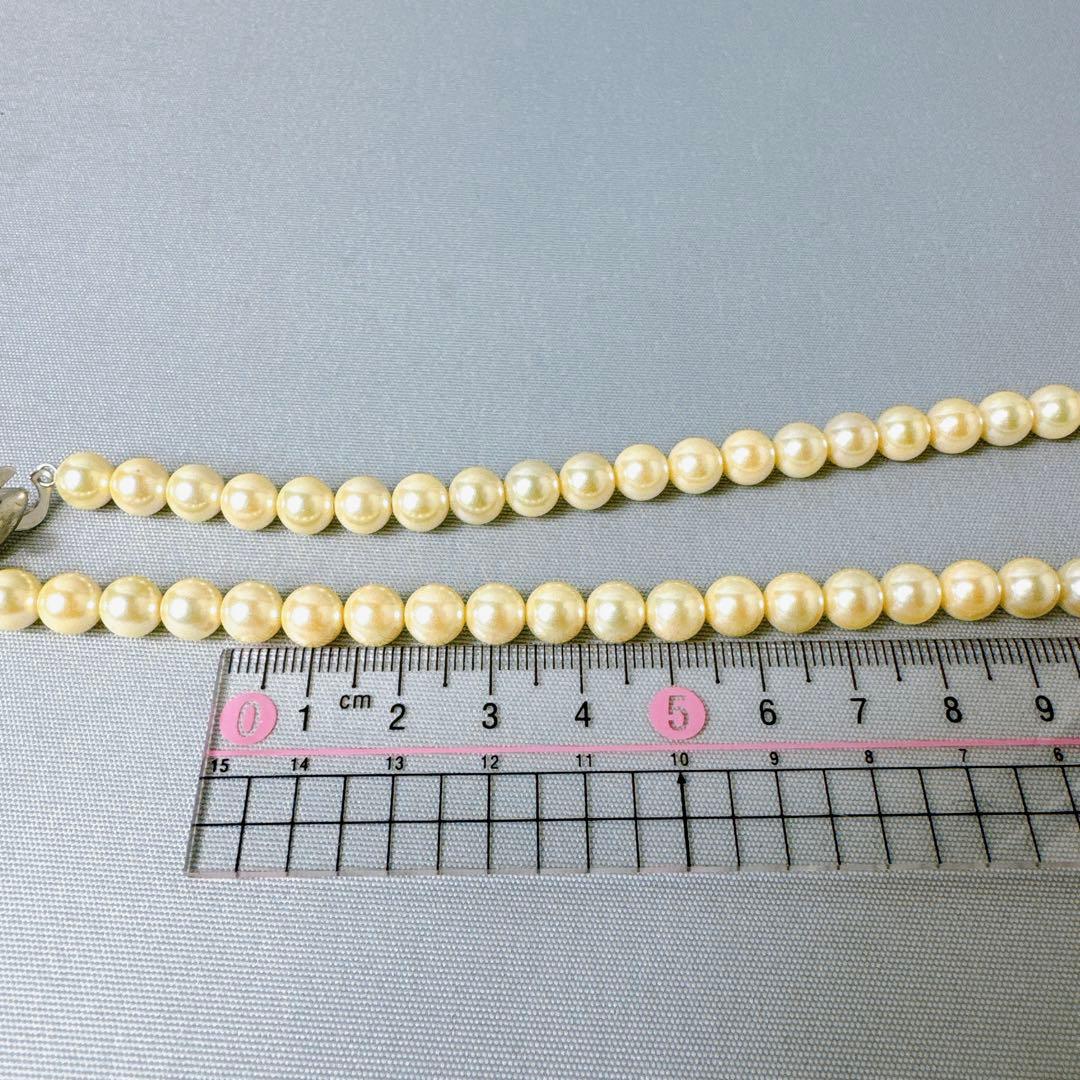 Honpa Akoya pearl necklace with 7mm round pearls and silver clasp, approximately 46cm long