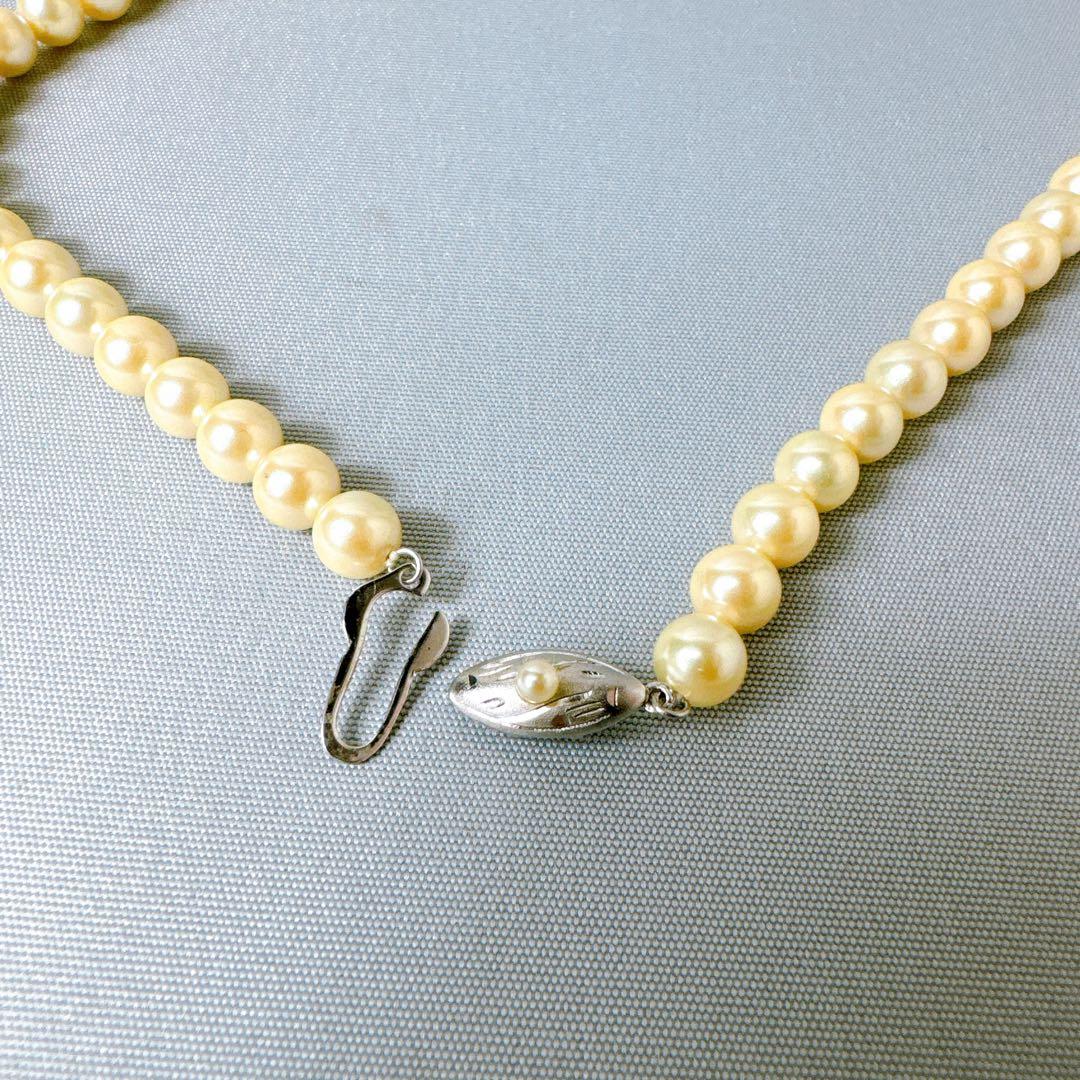 Honpa Akoya pearl necklace with 7mm round pearls and silver clasp, approximately 46cm long