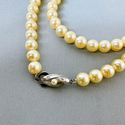 Honpa Akoya pearl necklace with 7mm round pearls and silver clasp, approximately 46cm long