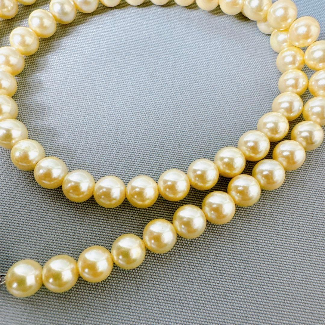 Honpa Akoya pearl necklace with 7mm round pearls and silver clasp, approximately 46cm long