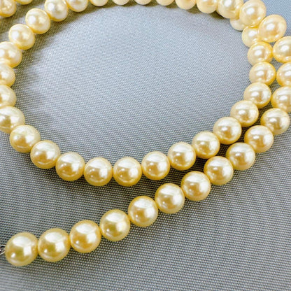 Honpa Akoya pearl necklace with 7mm round pearls and silver clasp, approximately 46cm long