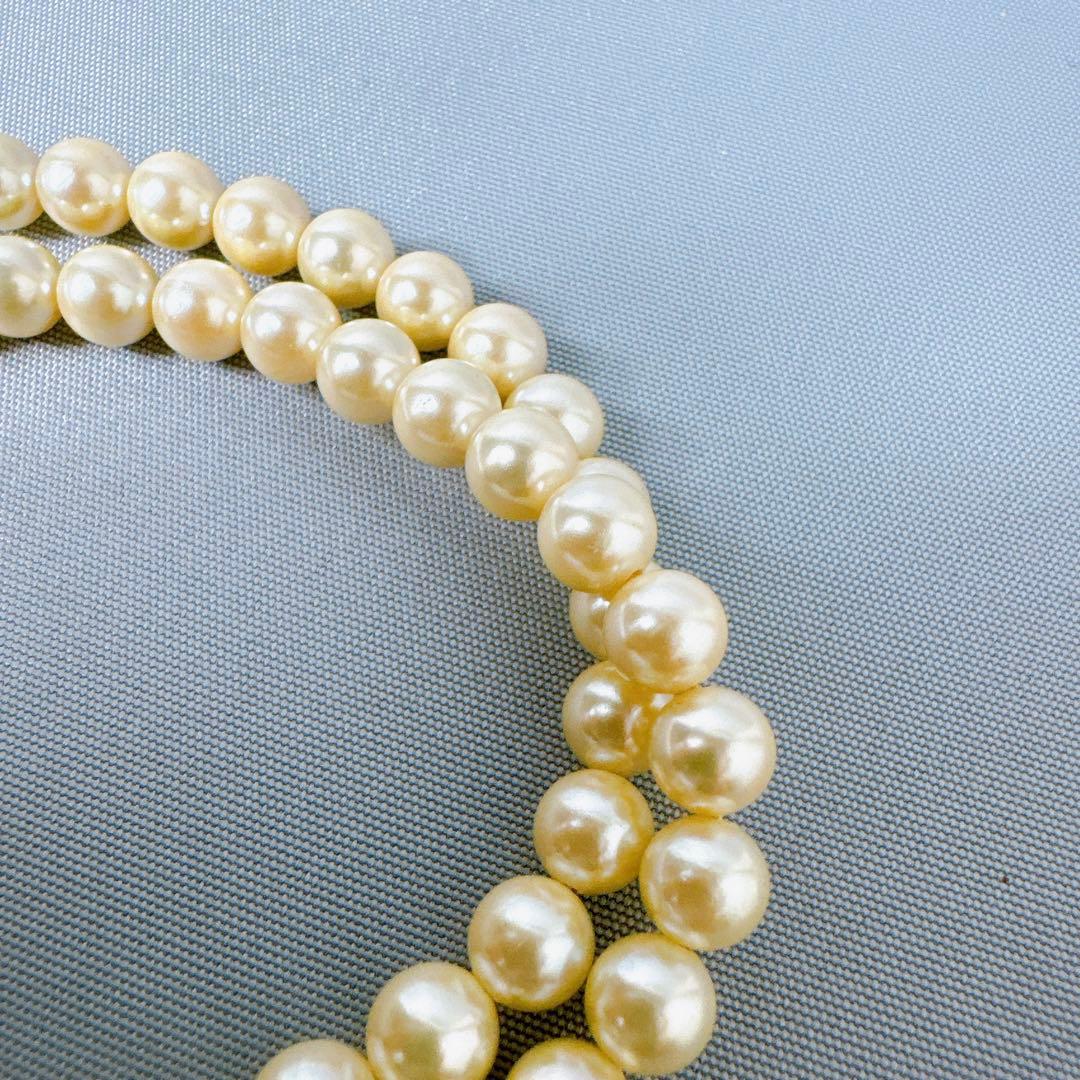 Honpa Akoya pearl necklace with 7mm round pearls and silver clasp, approximately 46cm long