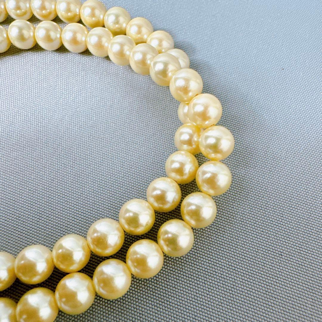 Honpa Akoya pearl necklace with 7mm round pearls and silver clasp, approximately 46cm long