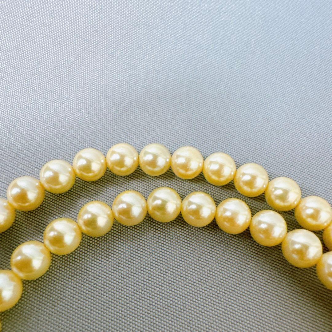 Honpa Akoya pearl necklace with 7mm round pearls and silver clasp, approximately 46cm long