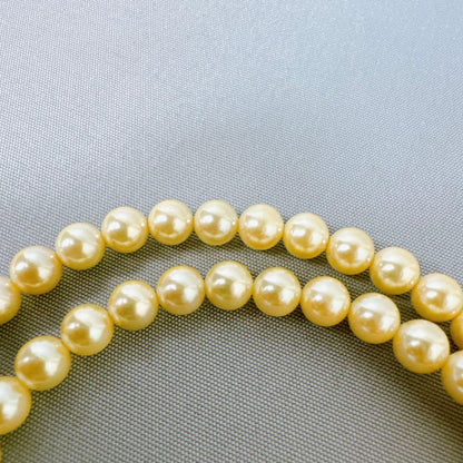 Honpa Akoya pearl necklace with 7mm round pearls and silver clasp, approximately 46cm long