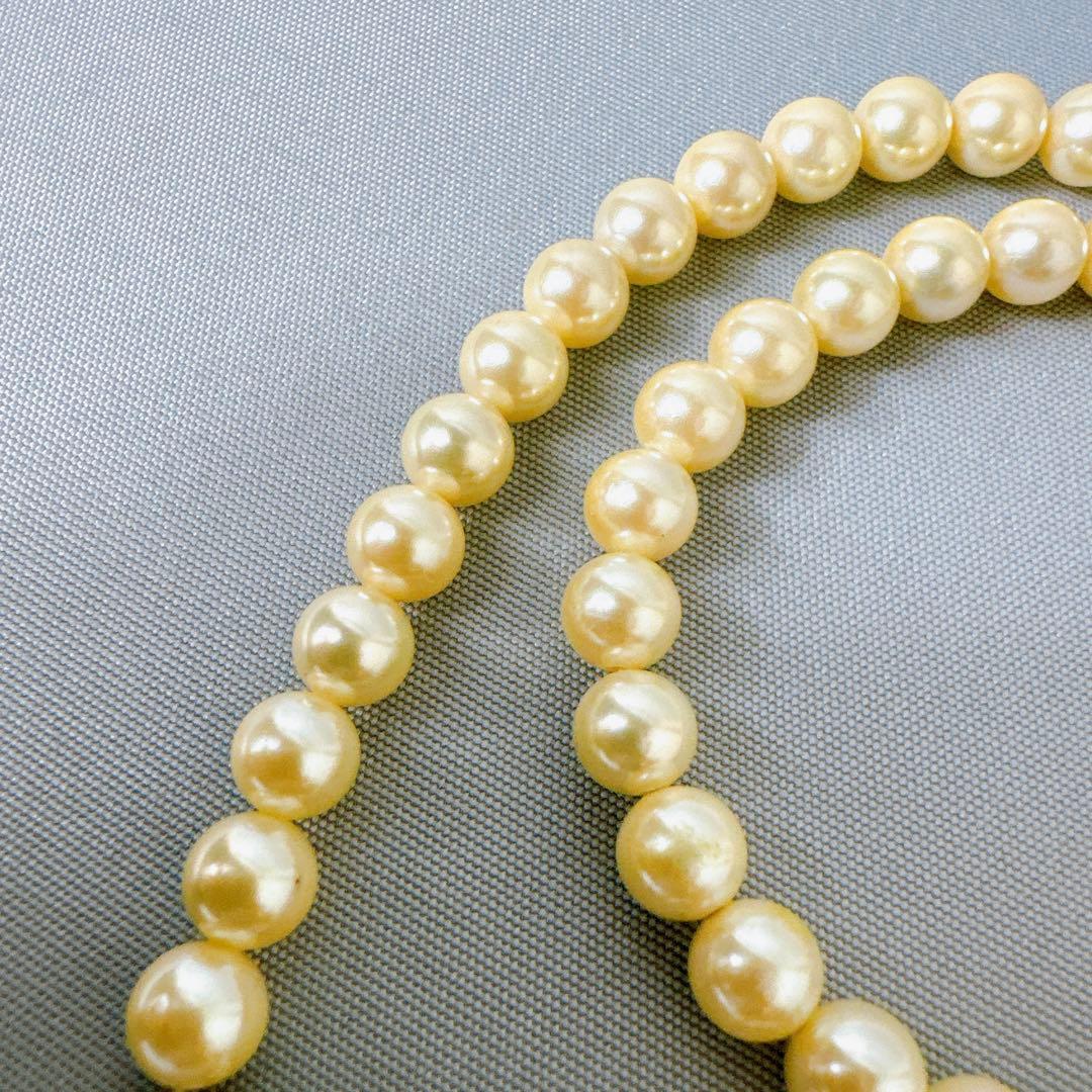 Honpa Akoya pearl necklace with 7mm round pearls and silver clasp, approximately 46cm long