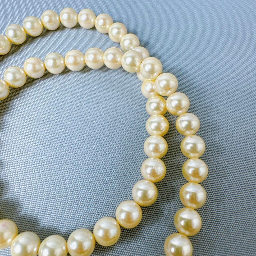Honpa Akoya pearl necklace with 7mm round pearls and silver clasp, approximately 46cm long