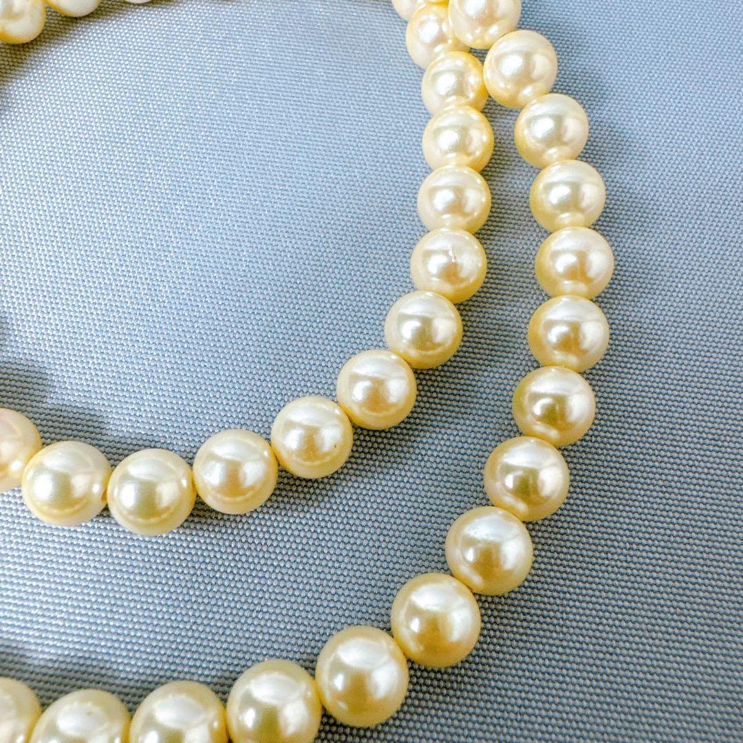 Honpa Akoya pearl necklace with 7mm round pearls and silver clasp, approximately 46cm long