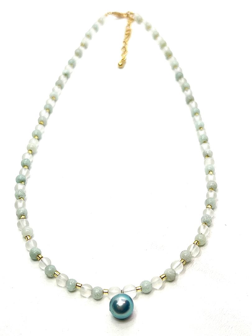 Akoya pearl necklace featuring black pearls, indigo blue pearls, and amazonite beads with adjustable length