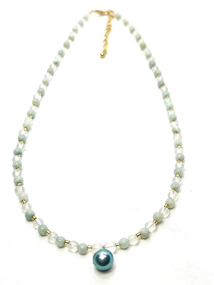 Akoya pearl necklace featuring black pearls, indigo blue pearls, and amazonite beads with adjustable length