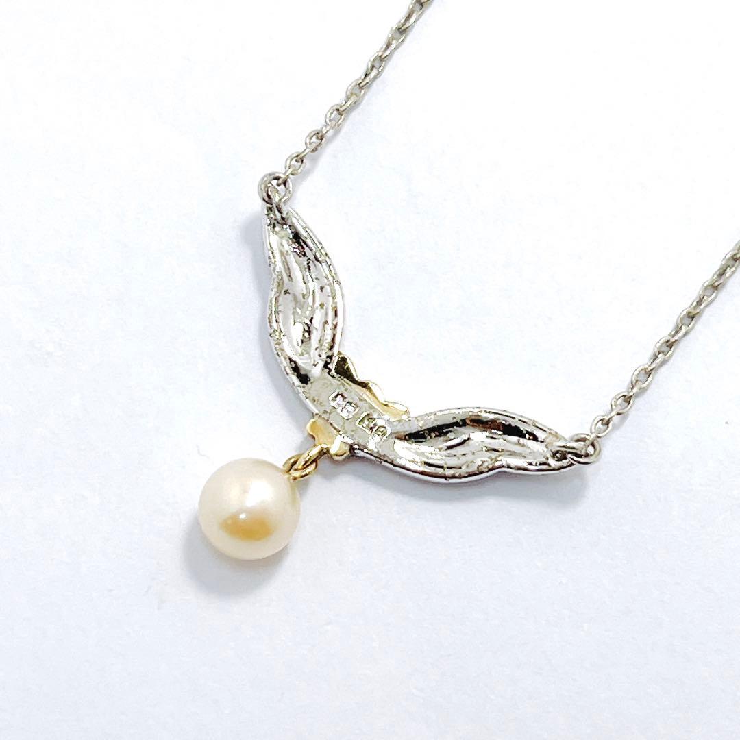 Mikimoto pearl necklace pendant featuring 5.9mm pearls with K18 yellow gold and silver chain, 38cm length