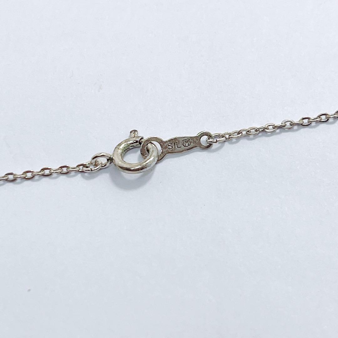 Mikimoto pearl necklace pendant featuring 5.9mm pearls with K18 yellow gold and silver chain, 38cm length