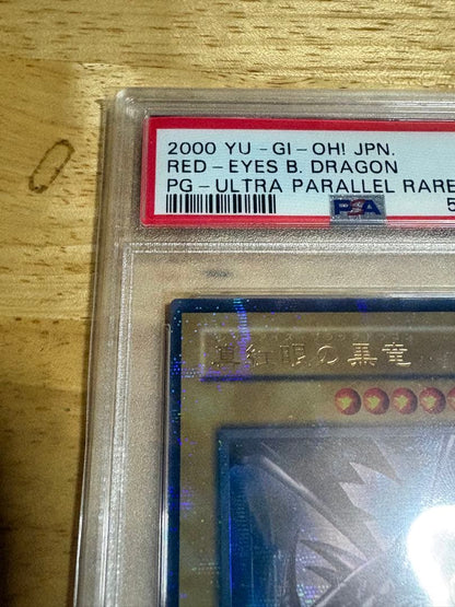 Bandai Cardas PSA9 Red Eyes Black Dragon Ultra Parallel Rare collectible card in protective case