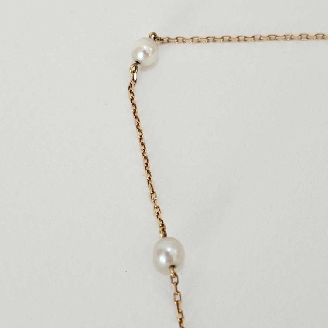 Mikimoto pearl necklace with 4.6mm pearls on 38cm 18K yellow gold chain weighing 2.8 grams