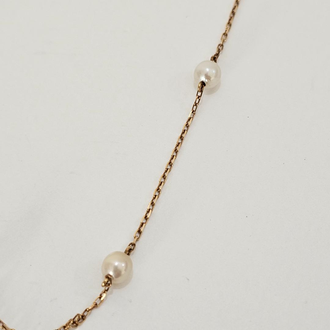 Mikimoto pearl necklace with 4.6mm pearls on 38cm 18K yellow gold chain weighing 2.8 grams