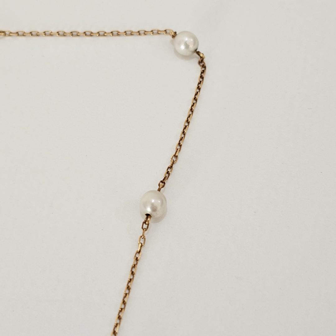 Mikimoto pearl necklace with 4.6mm pearls on 38cm 18K yellow gold chain weighing 2.8 grams