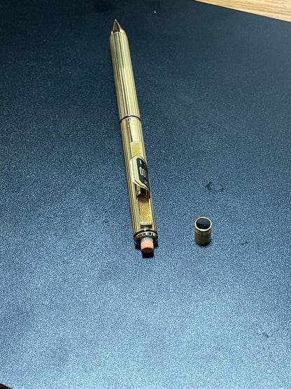 PILOT Mechanical Pencil Ballpoint Pen in gold color lying on a white background