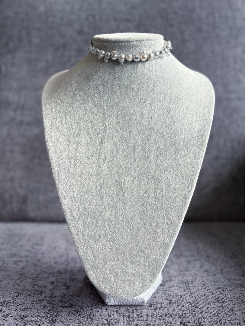 Elegant Akoya Pearl Feather Pearl Necklace with 7.5-8.7mm pearls and adjustable chain displayed on white background