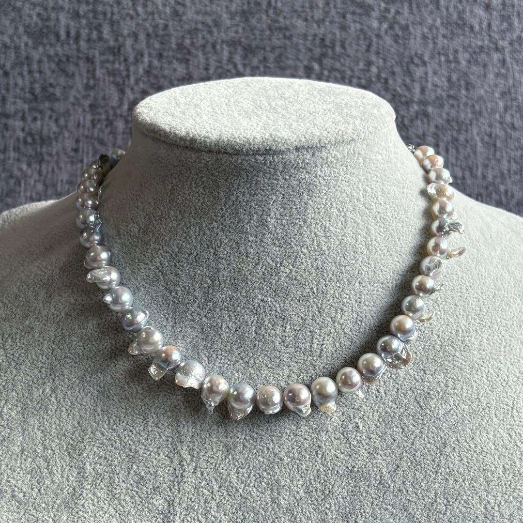 Elegant Akoya Pearl Feather Pearl Necklace with 7.5-8.7mm pearls and adjustable chain displayed on white background