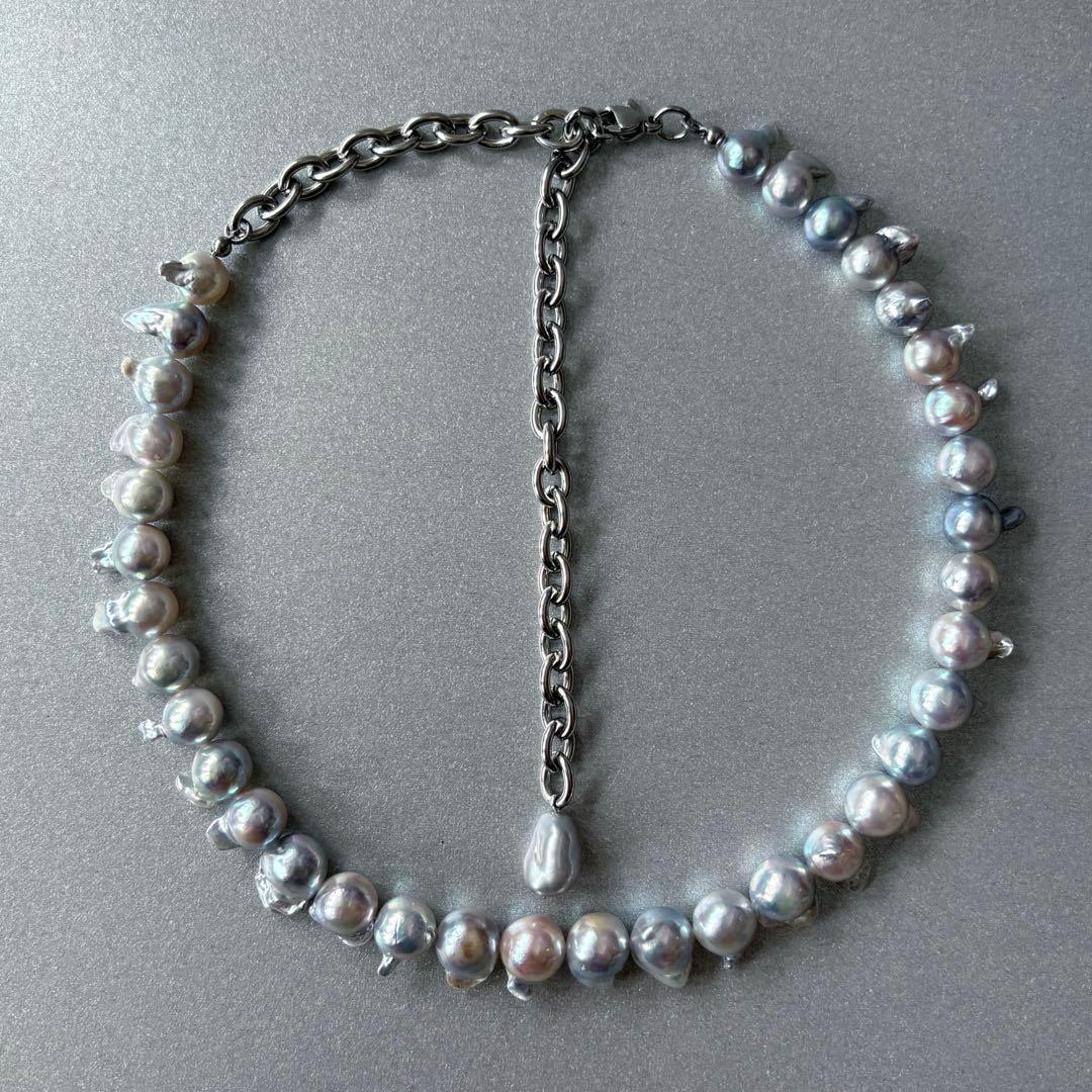 Elegant Akoya Pearl Feather Pearl Necklace with 7.5-8.7mm pearls and adjustable chain displayed on white background
