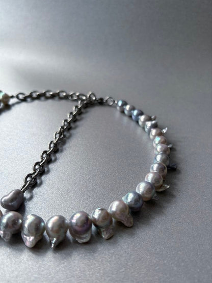 Elegant Akoya Pearl Feather Pearl Necklace with 7.5-8.7mm pearls and adjustable chain displayed on white background