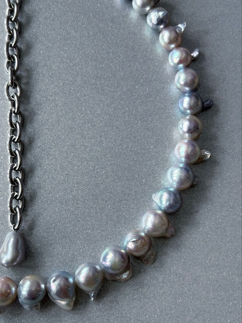 Elegant Akoya Pearl Feather Pearl Necklace with 7.5-8.7mm pearls and adjustable chain displayed on white background