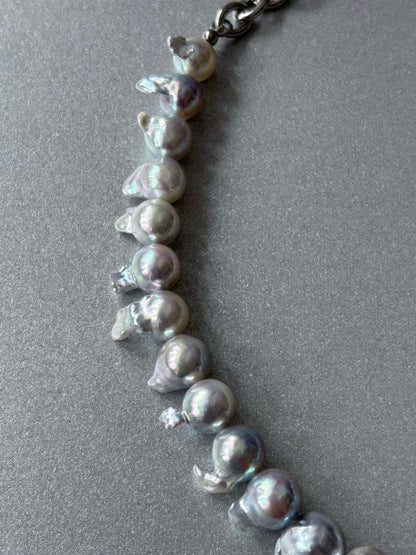 Elegant Akoya Pearl Feather Pearl Necklace with 7.5-8.7mm pearls and adjustable chain displayed on white background