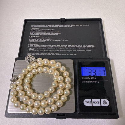 Akoya pearl necklace featuring 6.8-7.3 mm pearls on a 43.5 cm silver chain