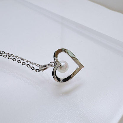 Mikimoto Heart Pearl Silver Necklace with 1.2 cm heart-shaped pearl pendant on 38 cm silver chain