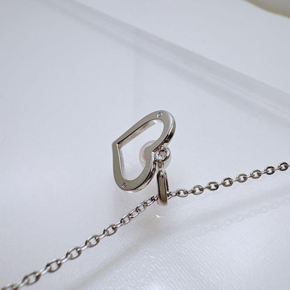 Mikimoto Heart Pearl Silver Necklace with 1.2 cm heart-shaped pearl pendant on 38 cm silver chain