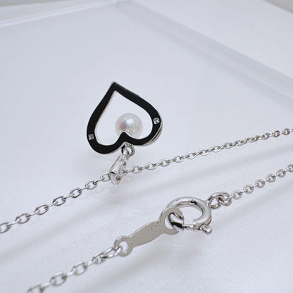 Mikimoto Heart Pearl Silver Necklace with 1.2 cm heart-shaped pearl pendant on 38 cm silver chain