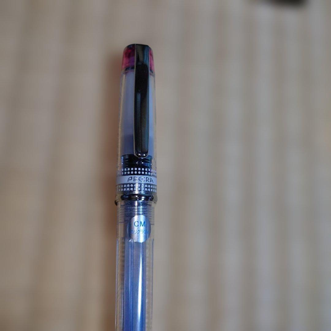 PILOT Prera Transparent Pink fountain pen with CM nib for calligraphy, shown used with visible wear