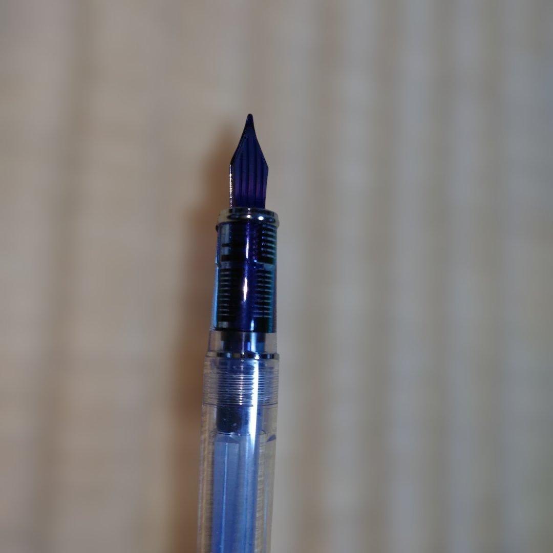 PILOT Prera Transparent Pink fountain pen with CM nib for calligraphy, shown used with visible wear