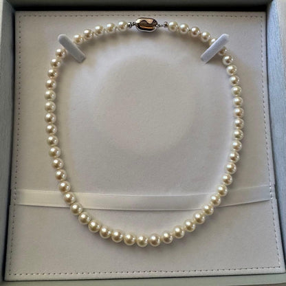 Akoya pearl necklace with 7.5-8.0mm pearls and silver clasp, 43cm full length.