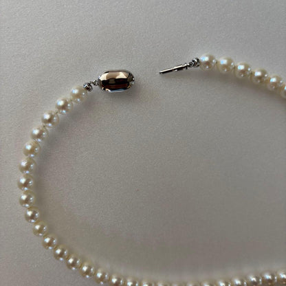 Akoya pearl necklace with 7.5-8.0mm pearls and silver clasp, 43cm full length.