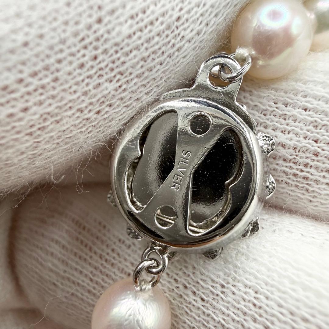 Akoya pearl necklace with 7mm pearls on a 42cm chain, styled for entrance ceremony and graduation events