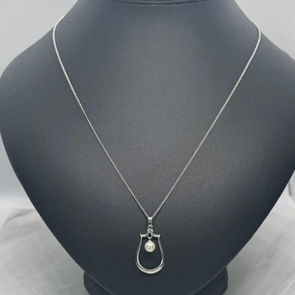 Mikimoto Akoya pearl single pearl necklace pendant in silver with horseshoe design and 5.2 mm pearl