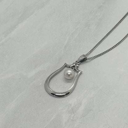 Mikimoto Akoya pearl single pearl necklace pendant in silver with horseshoe design and 5.2 mm pearl