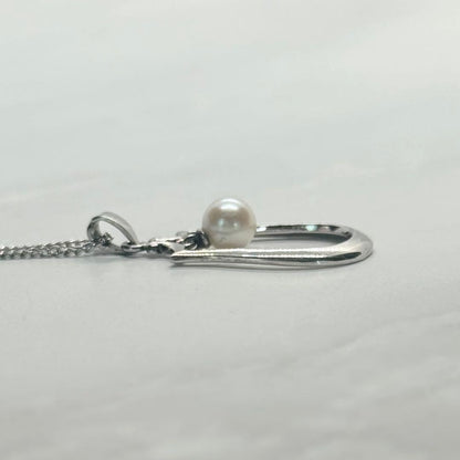 Mikimoto Akoya pearl single pearl necklace pendant in silver with horseshoe design and 5.2 mm pearl