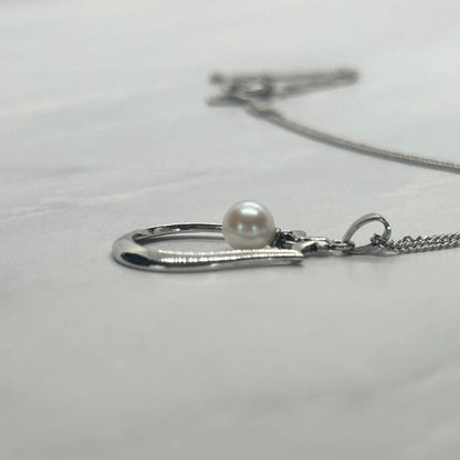 Mikimoto Akoya pearl single pearl necklace pendant in silver with horseshoe design and 5.2 mm pearl