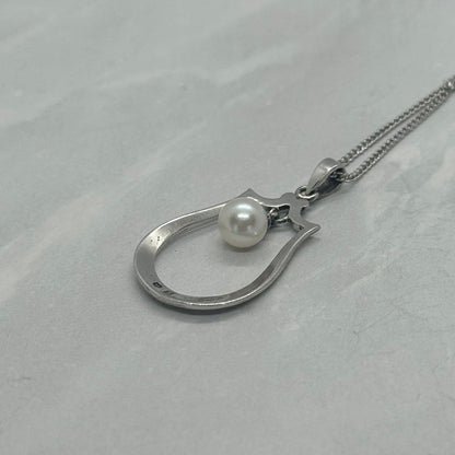Mikimoto Akoya pearl single pearl necklace pendant in silver with horseshoe design and 5.2 mm pearl
