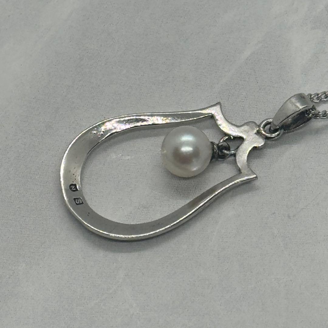 Mikimoto Akoya pearl single pearl necklace pendant in silver with horseshoe design and 5.2 mm pearl