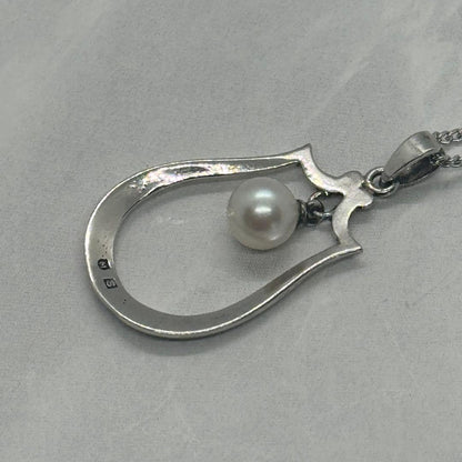 Mikimoto Akoya pearl single pearl necklace pendant in silver with horseshoe design and 5.2 mm pearl