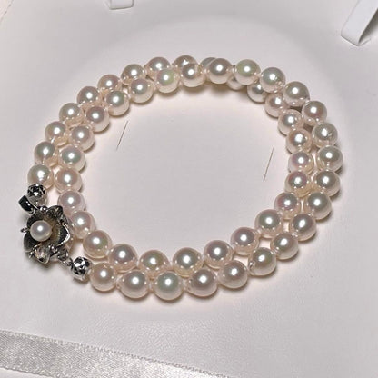 Kagayaki Hanadama Akoya pearl necklace with white semi-round pearls 6.5-7.0mm on silver chain
